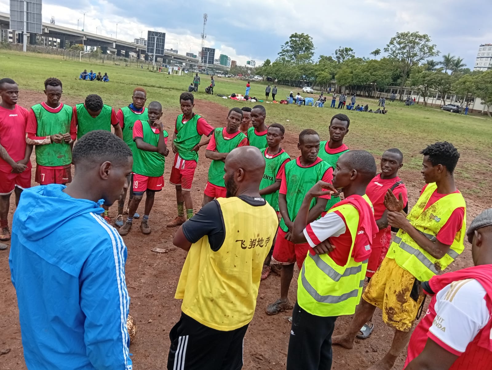 DFFK COACH AND GREEN TEAM.jpeg